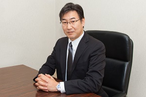 取締役社長　佐野 賢司